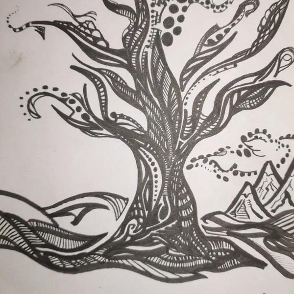 Henna Tree: original hand-drawn black ink illustration on white paper of a stylized tree with a heavily patterned trunk featuring vertical stripes, dot sequences, and decorative fills. Branches spread wide and curl at the tips with various organic pattern treatments. Small decorated creature-like forms appear in the upper branches. A minimal mountain range sketch occupies the lower right background. Ground roots spread in flowing decorative lines. Signed Basic Glitch in the lower right corner. Traditional ink drawing by BasicGlitch.